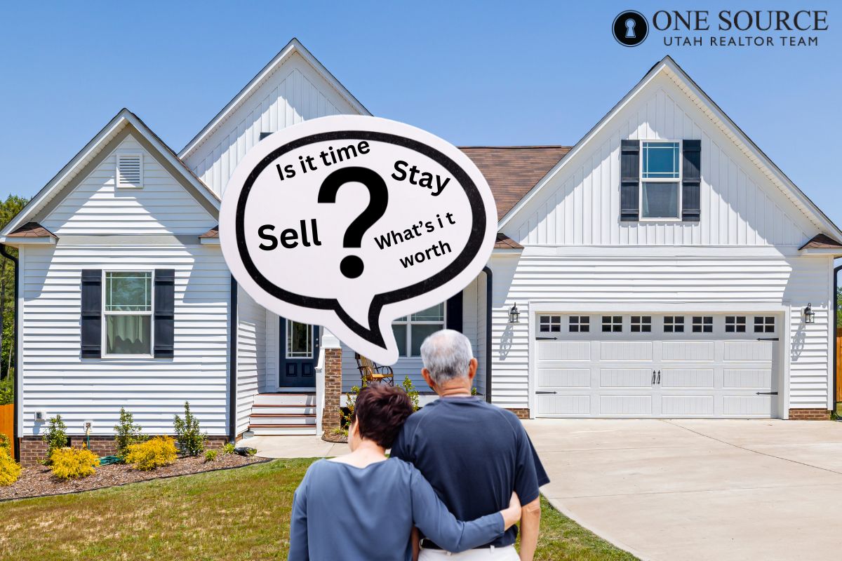 Couple contemplating home selling decisions outdoors.